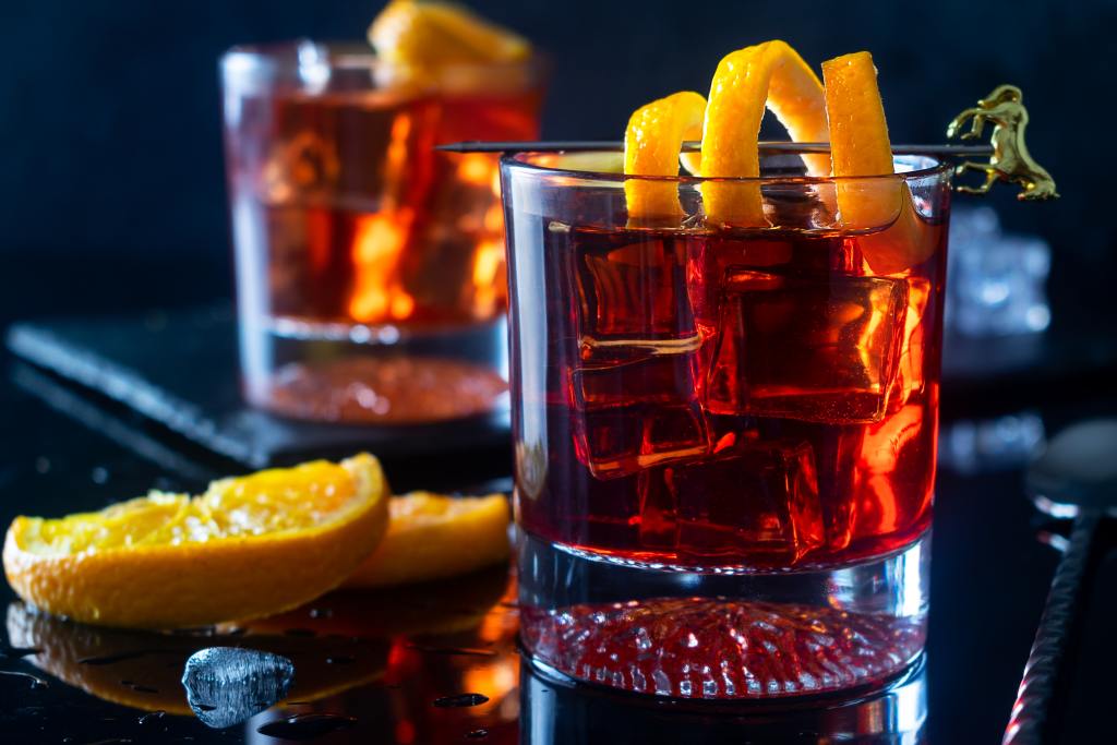 Negroni Cocktail with Orange Twist and Pin