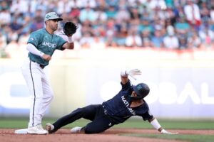 Nick Castellanos sliding into 2nd Base