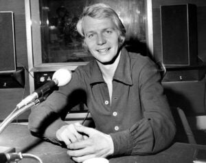 Film, TV star and soul singer David Soul sits in a radio studio to broadcast an interview.