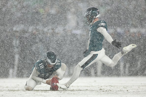 Jake Elliott #4 of the Philadelphia Eagles kicks a field goal against the Los Angeles Rams during the fourth quarter in the NFC Divisional Playoff. Game-Day snow from the game is on sale.