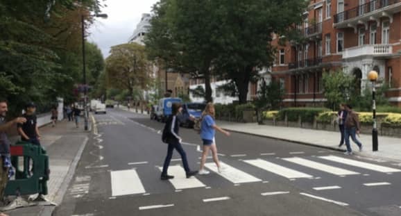 Michele Higgenbotham across Abbey Road