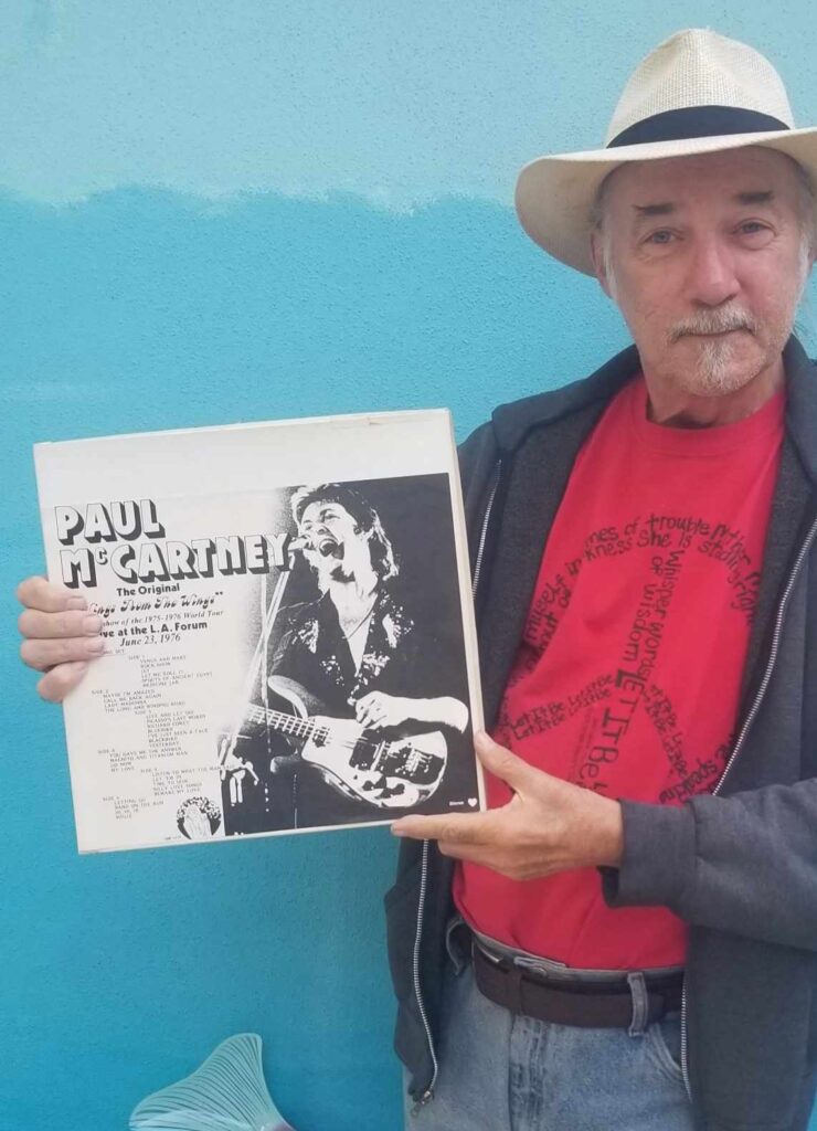Rick Glover with his bootleg LP.