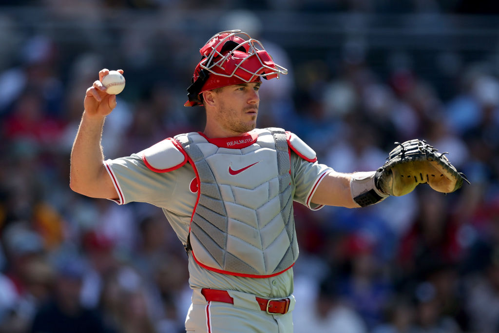 SAN DIEGO, CALIFORNIA - APRIL 28: JT Realmuto #10 of the Philadelphia Phillies throws back to the pitcher during a game against the San Diego Padres at Petco Park on April 28, 2024 in San Diego, California.