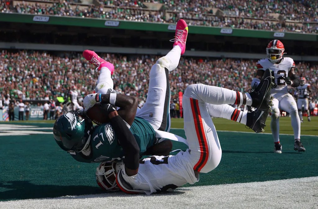 PHILADELPHIA, PENNSYLVANIA - OCTOBER 13: A.J. Brown #11 of the Philadelphia Eagles catches a touchdown pass against the Cleveland Browns during the second quarter at Lincoln Financial Field on October 13, 2024 in Philadelphia, Pennsylvania. 